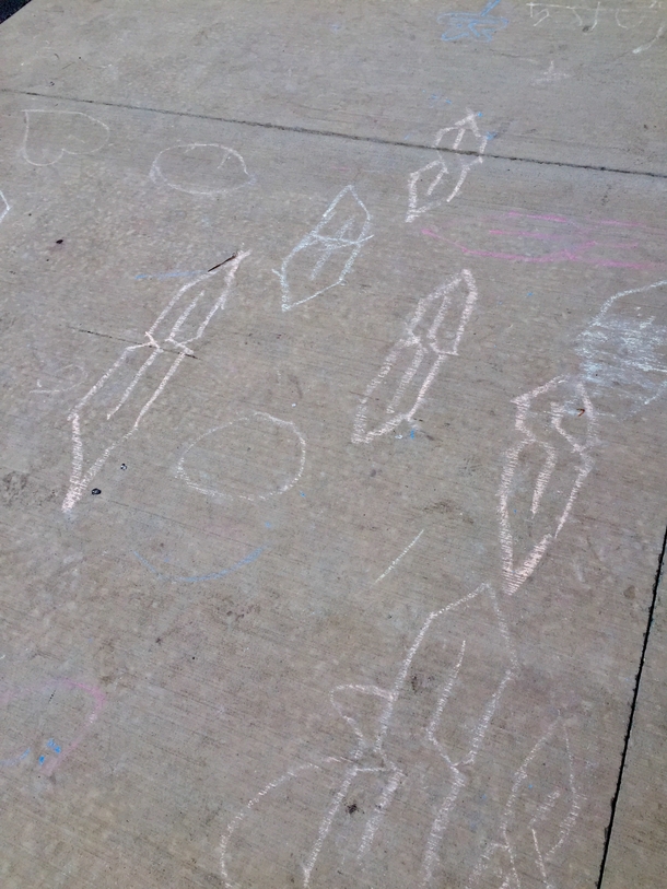 On an elementary school sidewalk mysterious symbols from ancient times have appeared