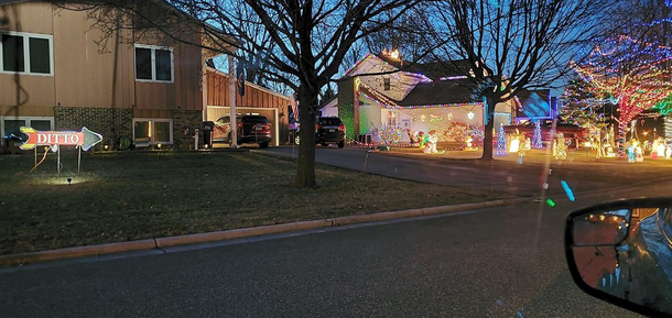 On the right is the home of our towns mayor The neighbor on the left does this every year