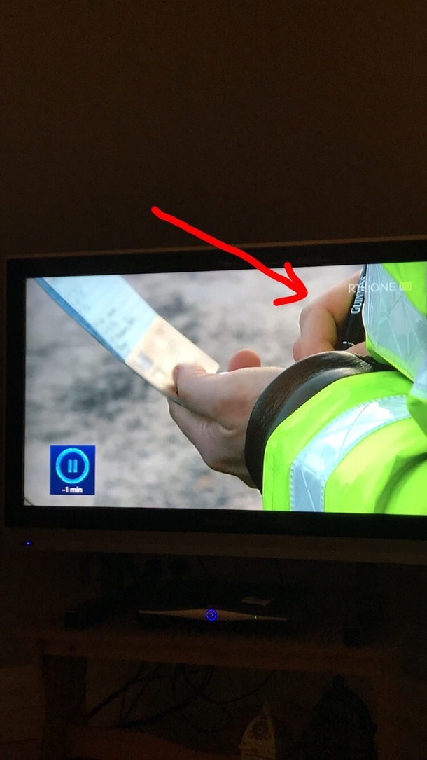 Only in Ireland would you see a Garda writing out a drink summons with a Guinness pen