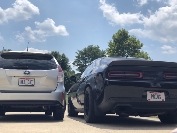 Opposite Day A year ago my best friend got personalized plates for his Hellcat I recently bought a Prius and decided to play along