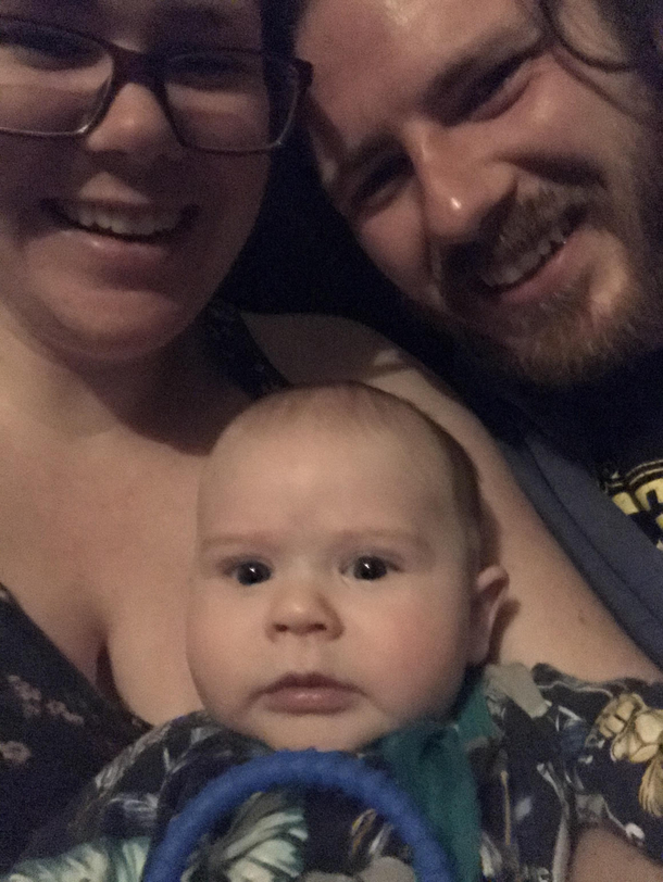 Our son looks like the Uber driver being forced to take a photo with the two drunk idiots in the back seat