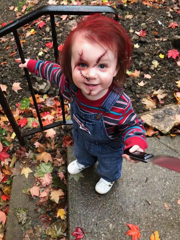Our two year old daughter Because when big sis wants to dress up as Jason Voorhees what better side kick than Chucky