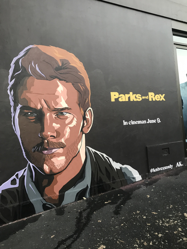 Painted on the side of a cinema near me New Jurassic Park Movie Ad