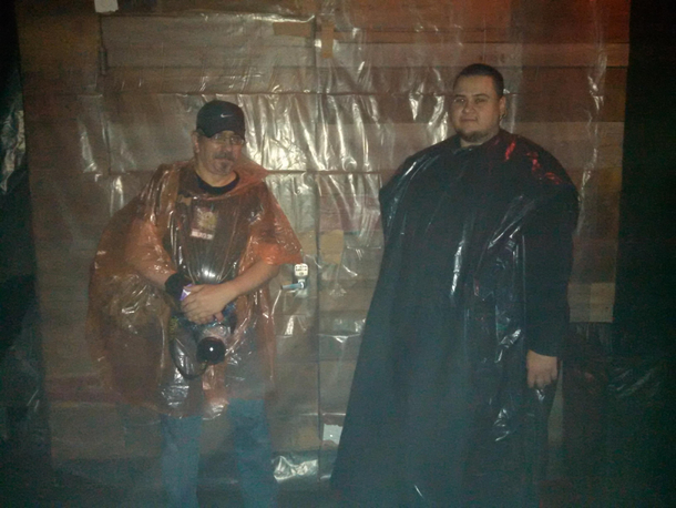 Photog and security at a GWAR show