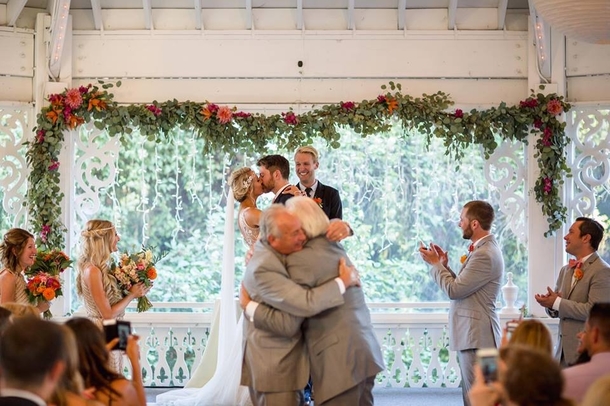 Pic #1 - Friend got married Dads photobomb the big kiss in most adorable way