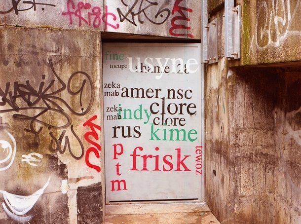 Pic #10 - Guy paints over graffiti with a more legible font