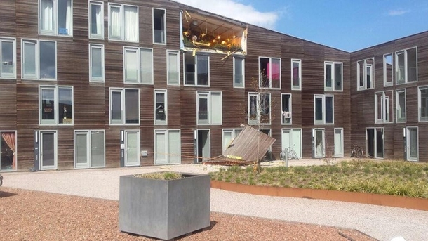 Pic #2 - An explosion caused the entire front wall of this apartment to fall off Surprise