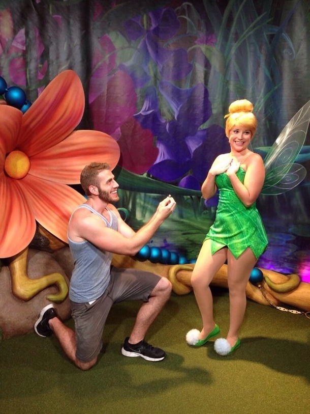 Pic #3 - Guy proposes to various Disney characters at Disney World