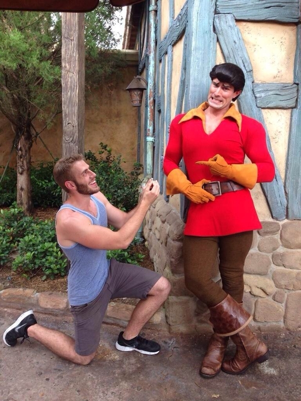 Pic #6 - Guy proposes to various Disney characters at Disney World