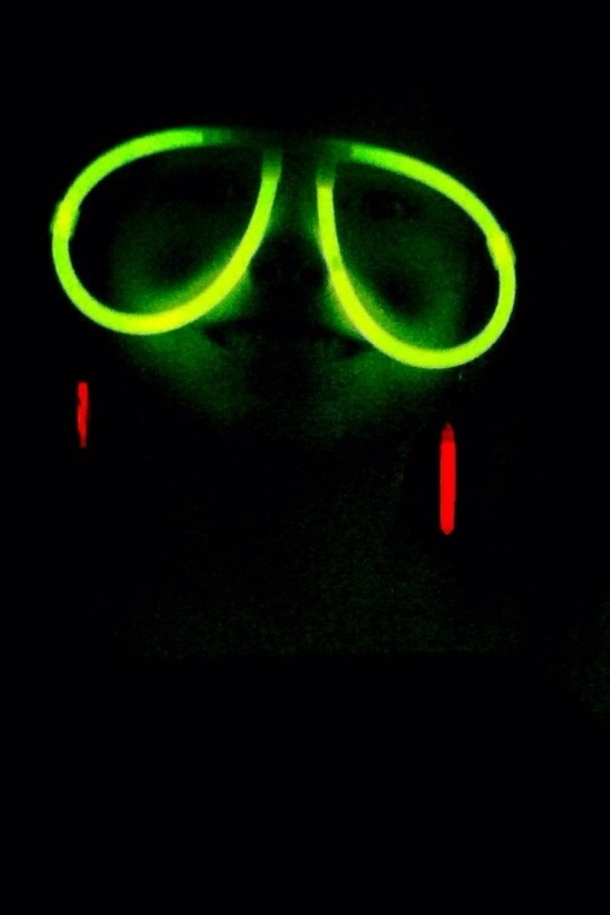 Pic of my daughter wearing glow in the dark glasses looks like a sloth on its way to the slowest rave ever
