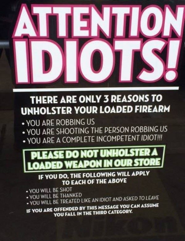 please do not unholster a loaded weapon in our store