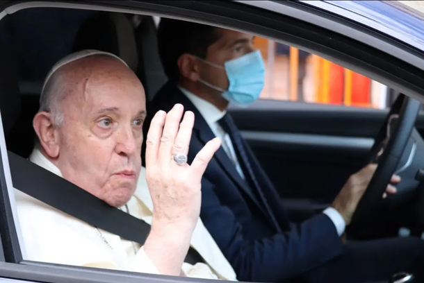 Pope Francis giving the globally-recognised chug a beer down gesture to the crowds