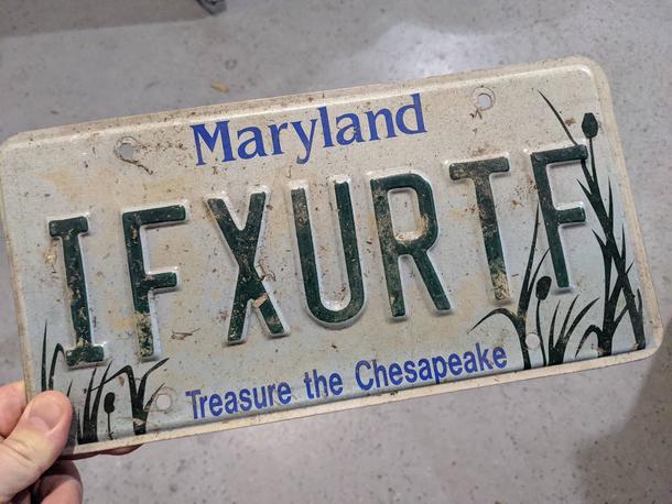 Previous owner of our house was a dentist and I found his old license plate in the basement
