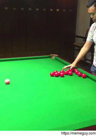 Professional player Marco Fu racking snooker balls