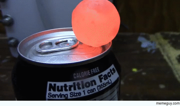 Red hot nickel ball on a can of soda