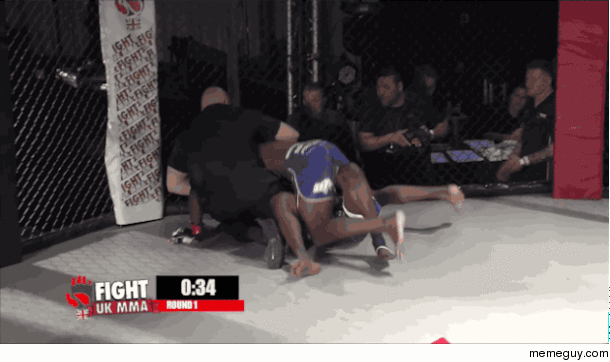 Ref puts fighter in choke hold
