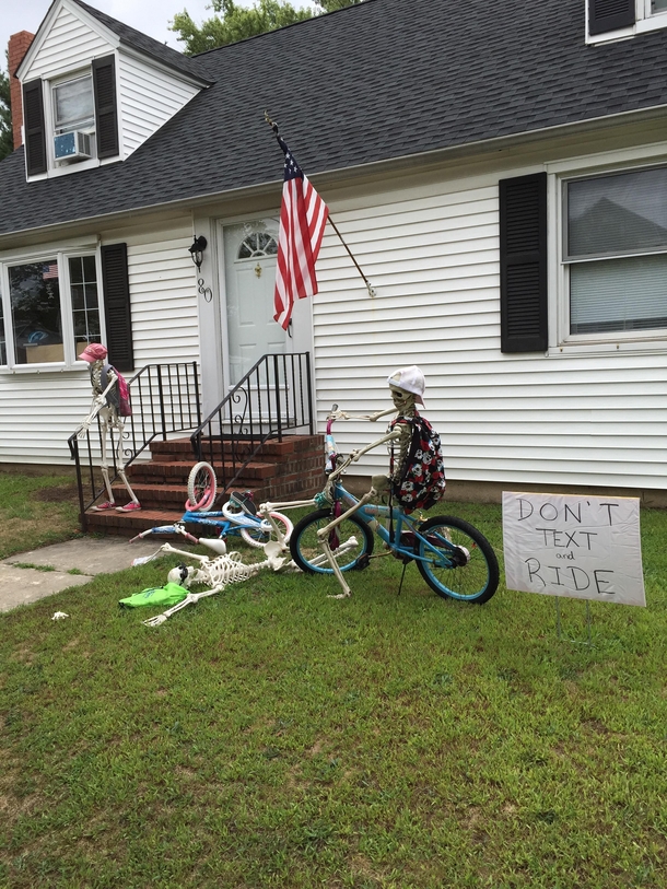 Remember the neighbors who never took down their Halloween decorations Heres their latest - a back to school PSA