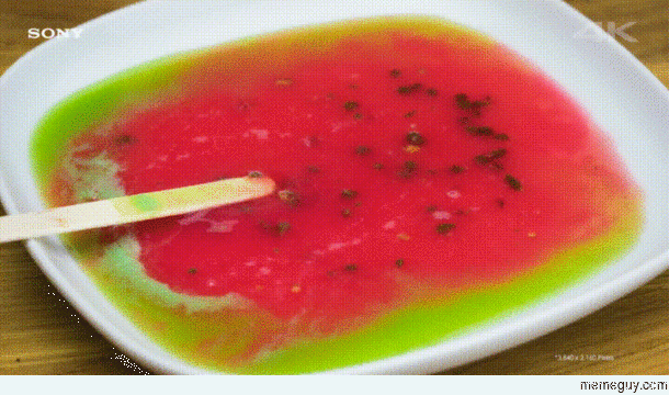 Reverse gif of a watermelon popsicle melting