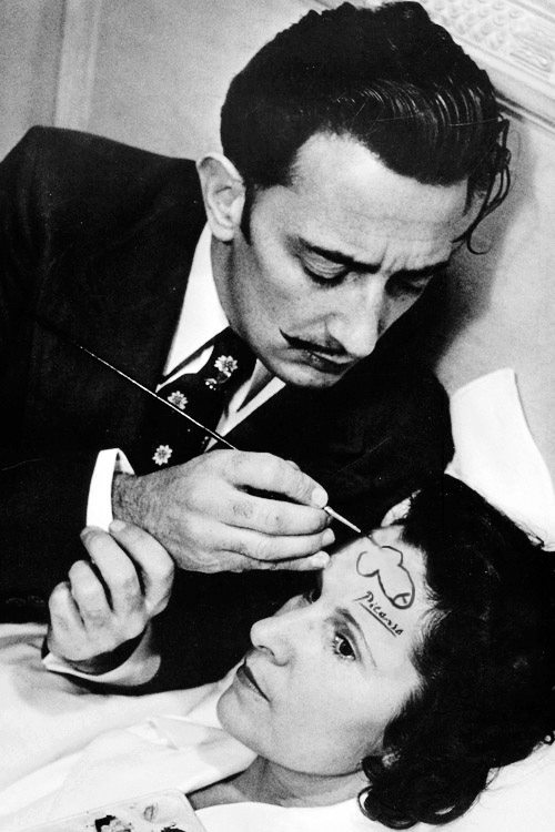 Salvador Dali paints a dick on a ladys forehead