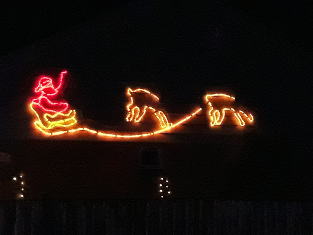 Santa and the headless reindeers He puts it up every year but I dont think he noticed some of the lights not working this year Its been up for weeks like this now