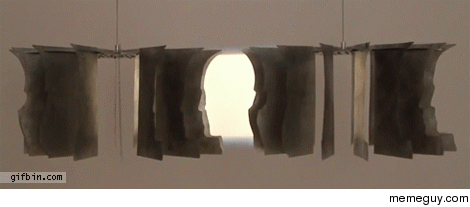 Sculpture of rotating head created by negative space