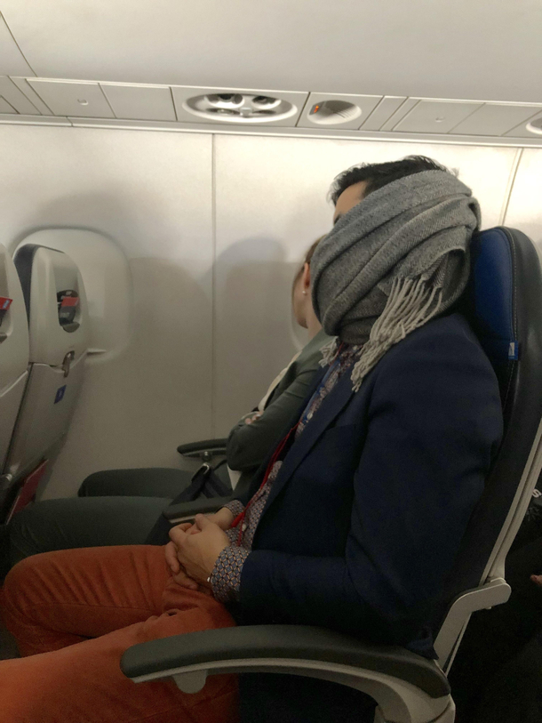 Shoutout to this hero He woke himself up snoring covered his mouth with his scarf and went back to sleep All I could hear was a slight rumble after that