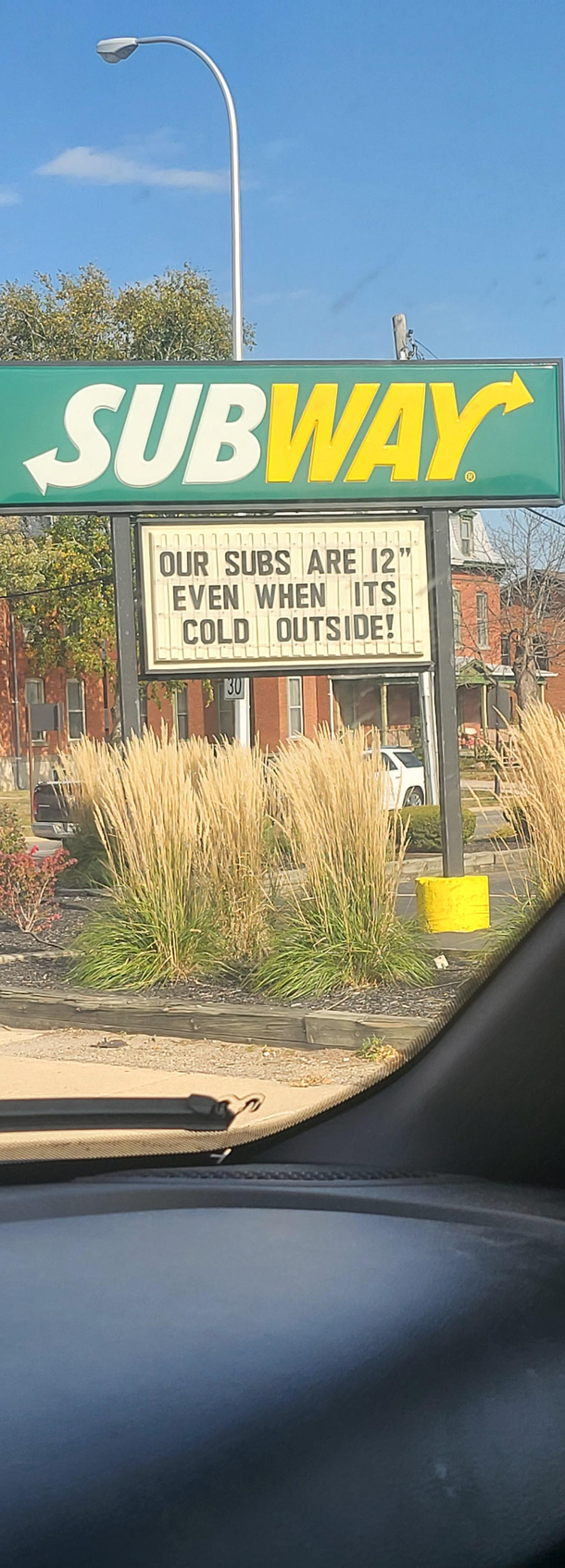 Sign guy at my local Subway needs a raise