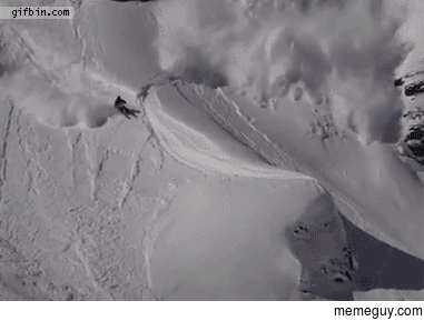 Skier outrunning an avalanche does a backflip