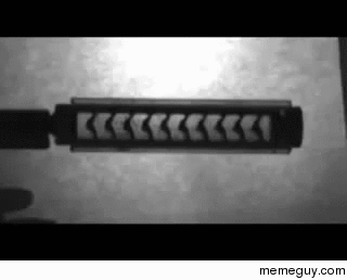 Slow motion x-ray of a bullet through a suppressor