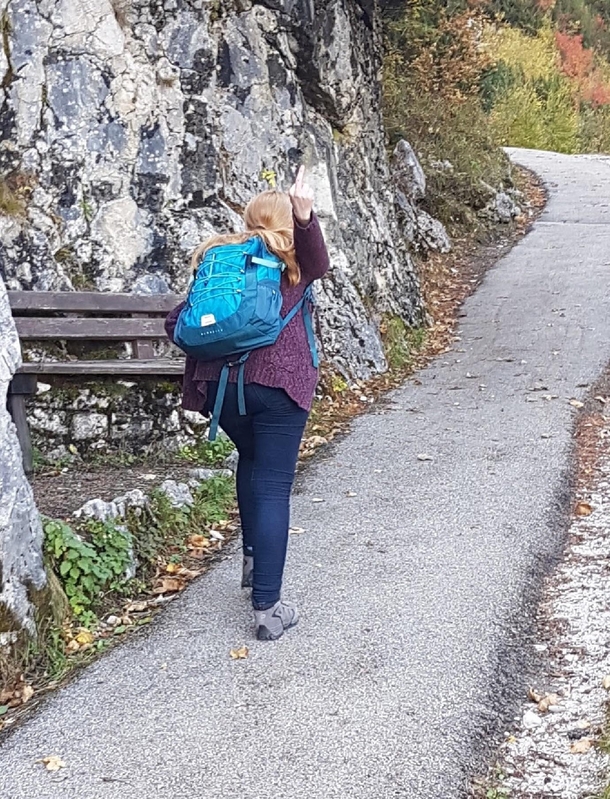 Smile for a picture of you climbing the hill honey