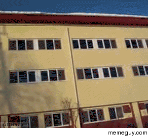 Snow falling off a roof 
