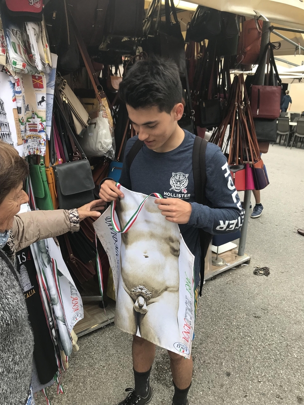 So apparently this old lady is helping my friend to find the right sized penis apron for him