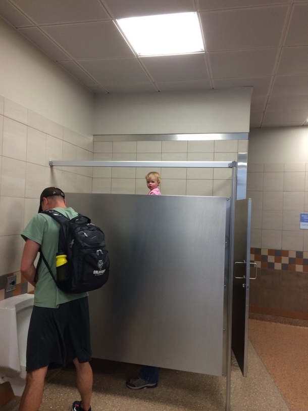 So I just saw this tall guy with a really weird head in the bathroom