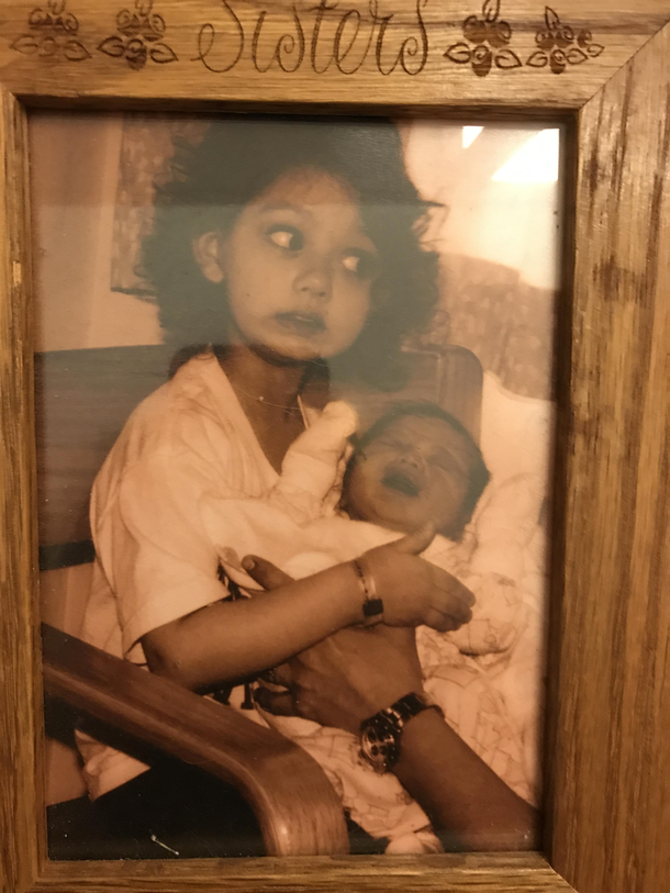 So Im pretty sure this is the best picture of my sister and I to ever exist lol This was at the hospital my first time ever meetingholding her