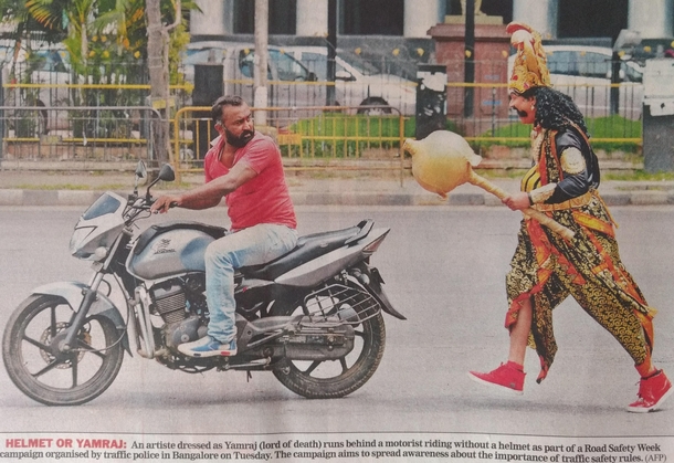 So Indian Police had a guy dress up as God of Death to chase people not wearing helmets