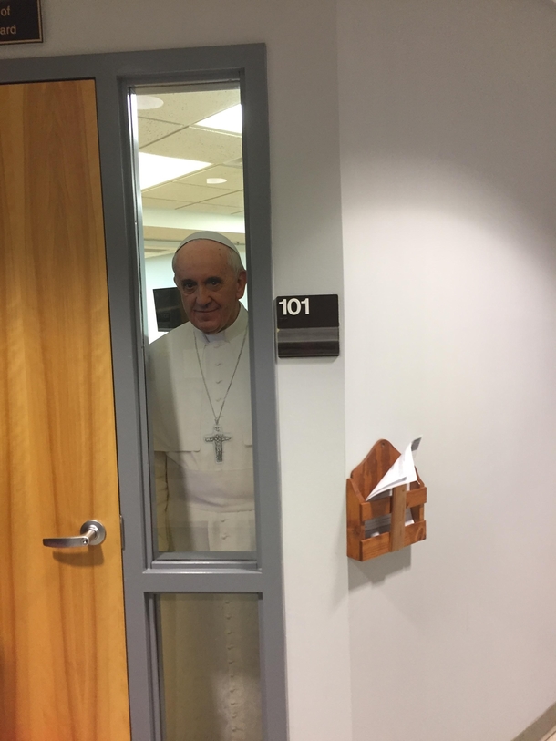 So my local orchestra practices in the catholic center not a religious organization but they let us have the space for free Recently the room added a pope cardboard cutout My stand mate moved the cutout to the window beside the cellos entrance I came arou
