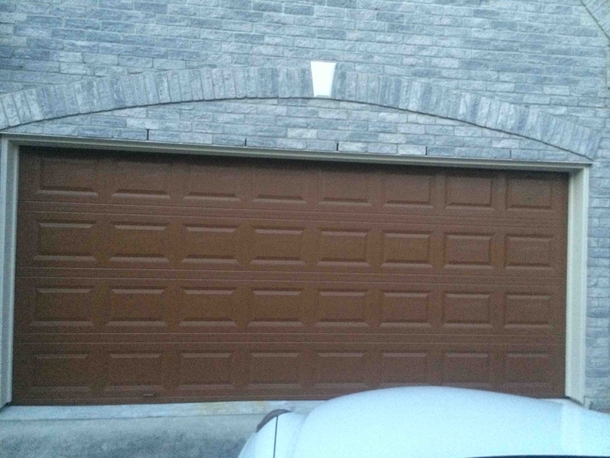 So my parents wanted their garage door to look wooden but I think it looks more like a giant Hersheys bar