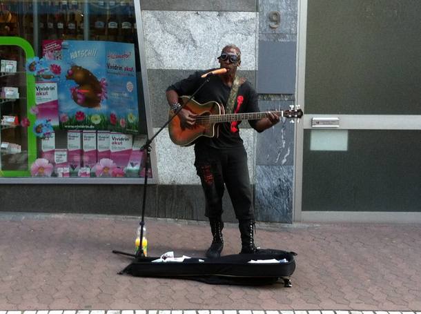 So this guy was playing a bass and wishing everyone a Merry Christmasyes thats a carrot