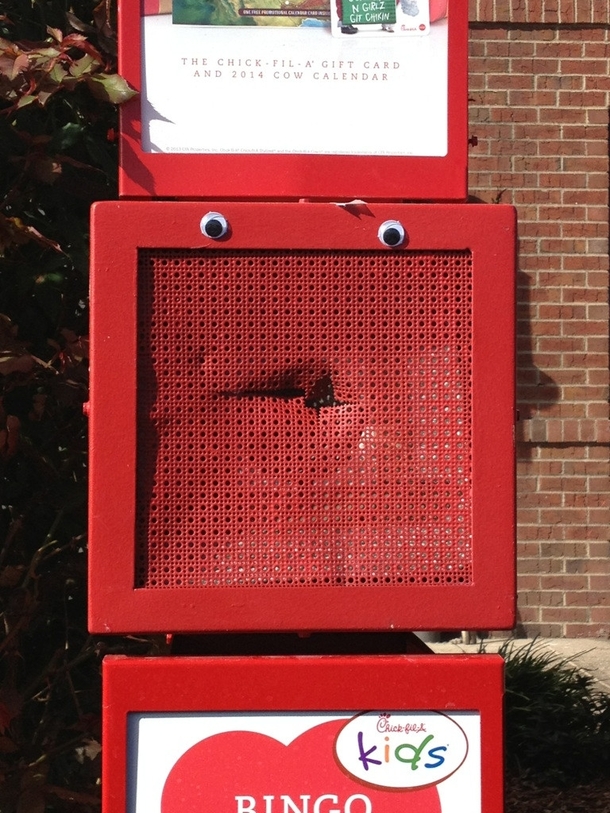 Someone added eyes to a drive thru I frequent and while it is hilarious I also feel like its judging me for my unhealthy eating habits