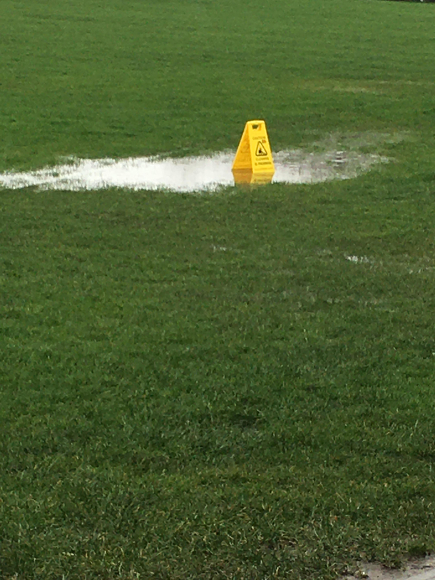 Someone at school has a sense of humour thats a wet floor sign