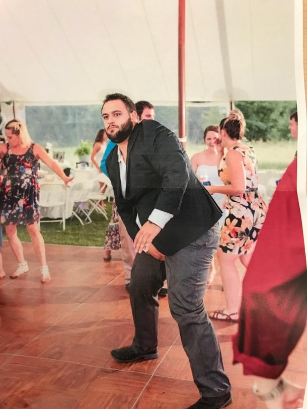 Someone captured the exact moment my brother-in-law realized he split his pants dancing at a wedding