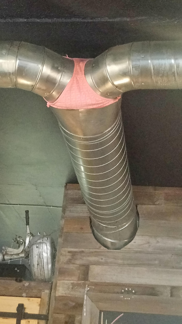 Someone had to get on a ladder twenty feet in the air to put this pair of panties onto this duct