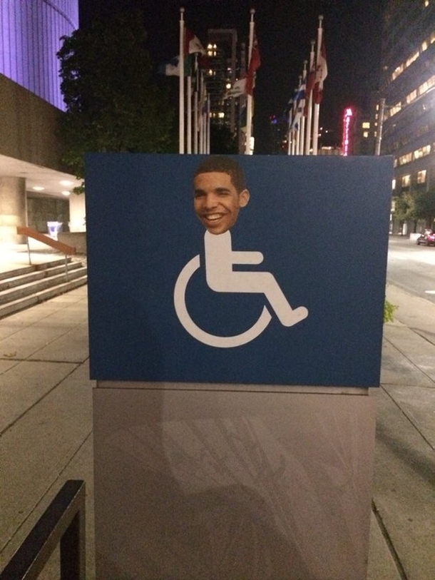 Someone has been putting Drakes head on wheelchair signs