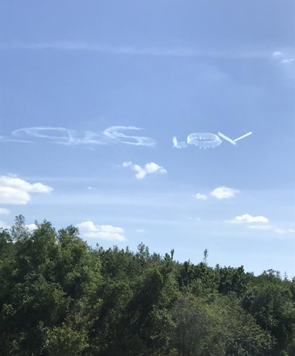 Someone in a plane at Walt Disney world wrote sus lol in the sky Taken today