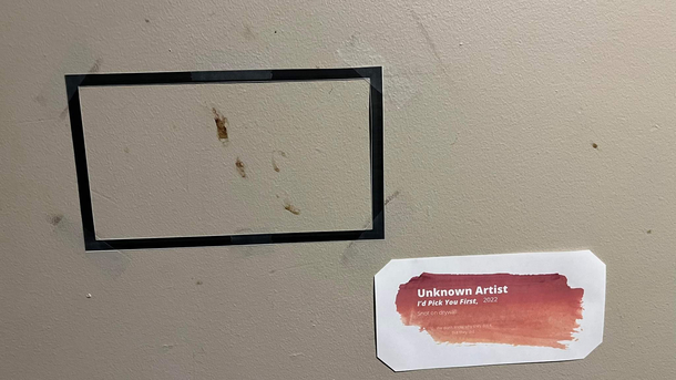 Someone in my apartment building spread his boogers on the wall So I framed it