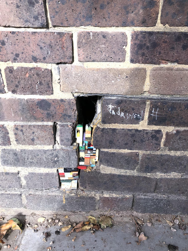 Someone plugged a hole in the wall with legos and TNT