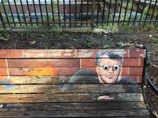 Someone put googly eyes on the Stephen King bench