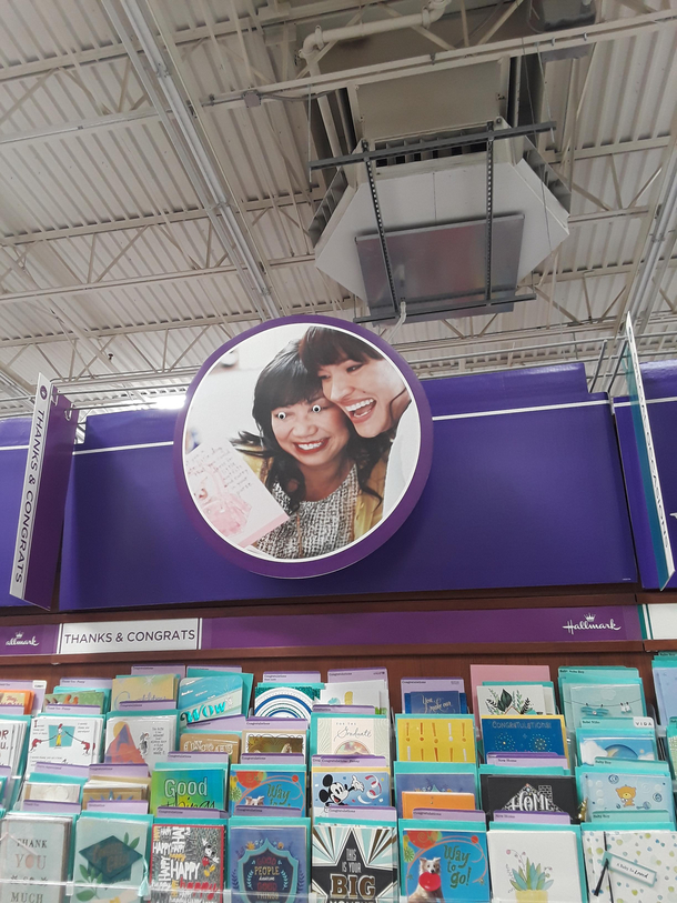 Someone put googly-eyes on this card display at my local Walmart