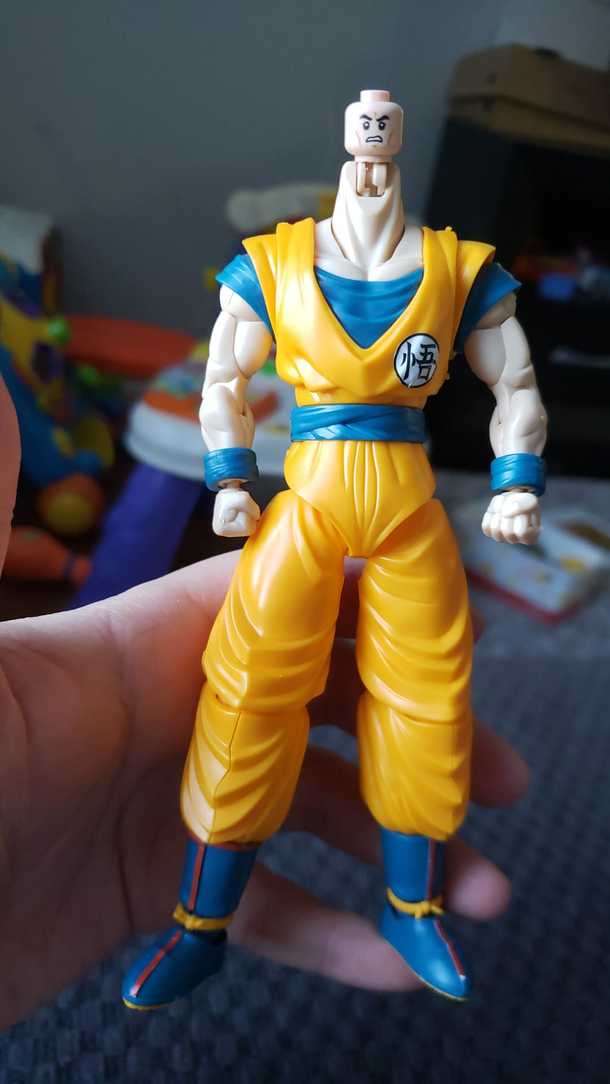 Spent about two hours putting together this model action figure of Super Saiyan Blue Goku and my  year old nephew had other plans for Gokus head