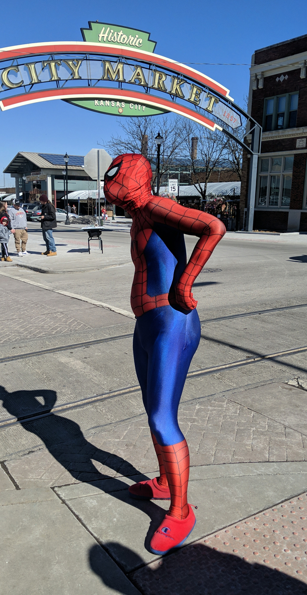 Spider-Man waiting for the bus